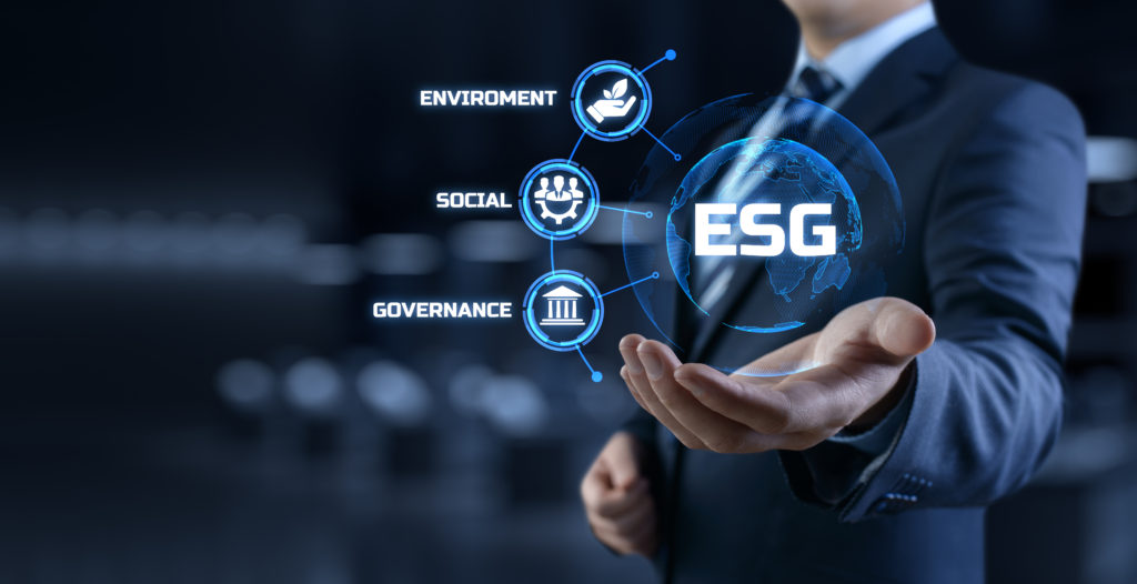 ESG environmental social governance business strategy investing concept. Businessman pressing button on screen.